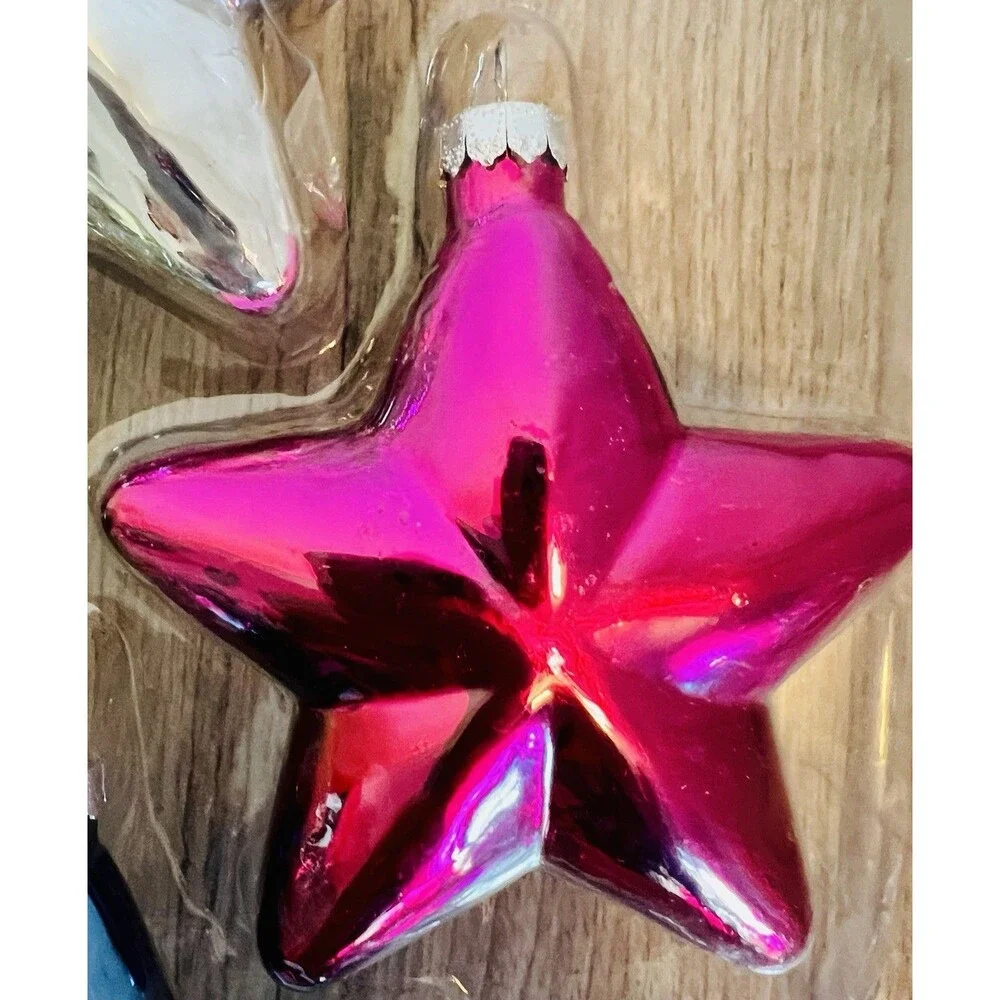 Handcrafted Glass Ornament Set features four star-shaped ornaments metallic
